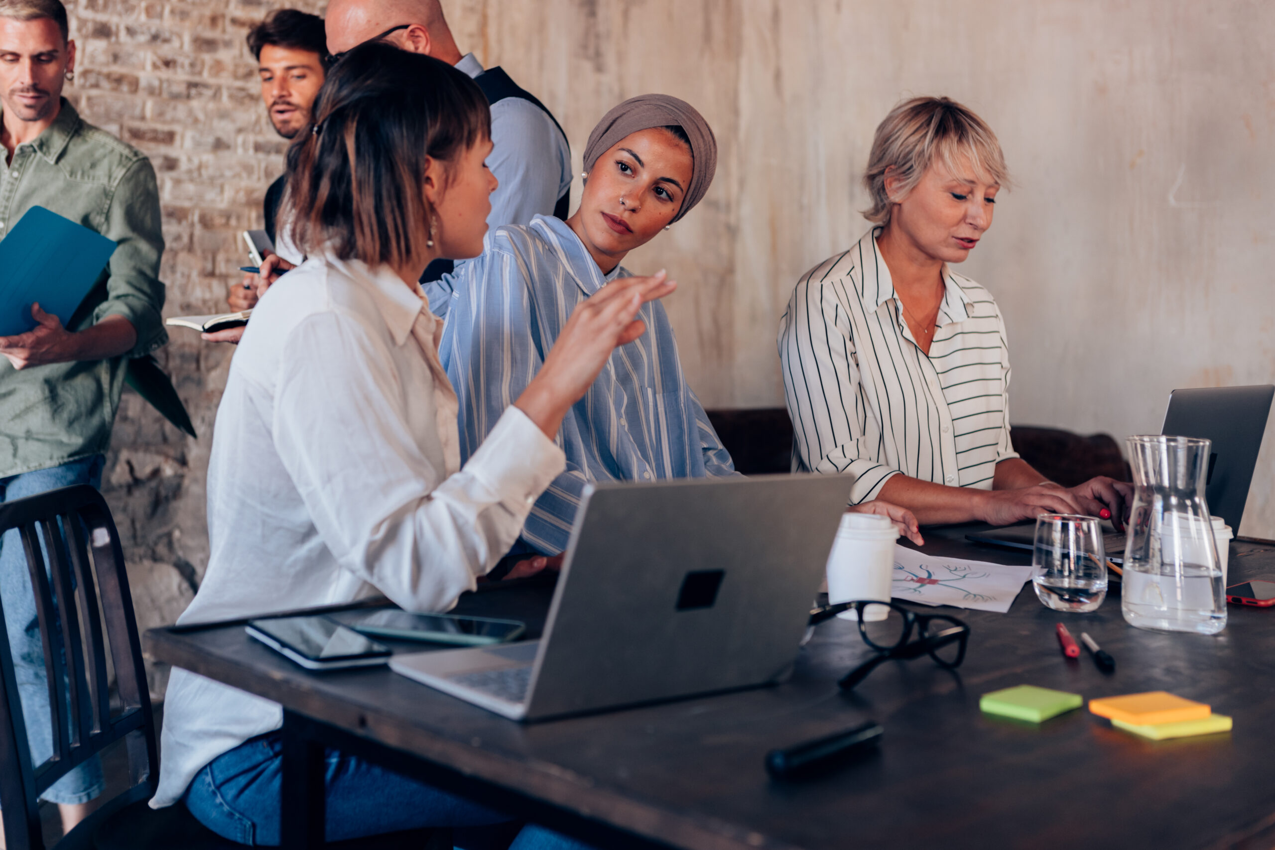 diverse colleagues businesswomen working in team in business office